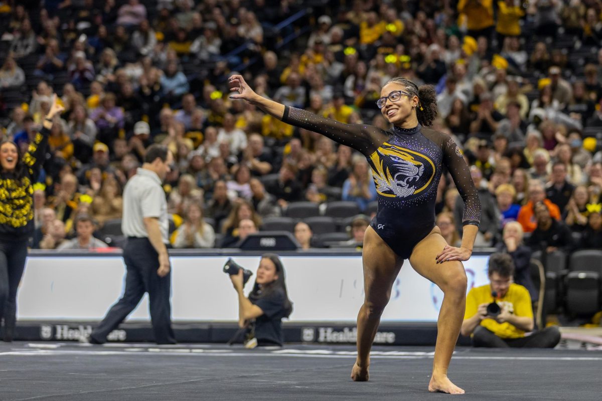 Missouri gymnast Ayla Acevedo poses like a tiger during her floor routine for the meet against The Florida Gators on Friday, Feb. 7 at Mizzou Arena in Columbia, Mo. Acevedo and her two teammates, Kaia Tanskanen and Kennedy Griffin had a three-way tie on floor with a score of 9.925.