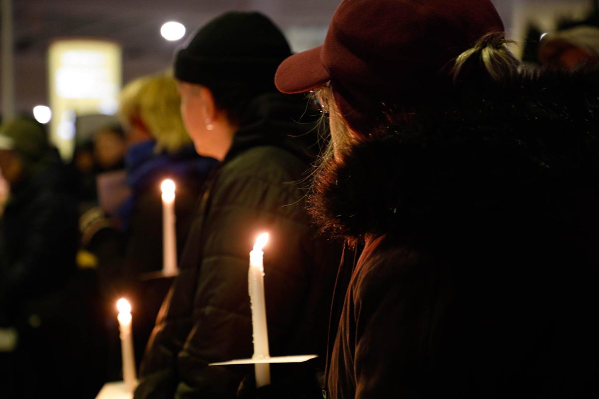 Vigil attendees listen to vigil speaker Lindsay Browning, honoring Alex Pretti on Sunday, Feb. 1, at the Harry S. Truman Memorial Veterans’ Hospital in Columbia, Mo. The memorial was hosted by the American Federation of Government Employees through CoMo for Progress.