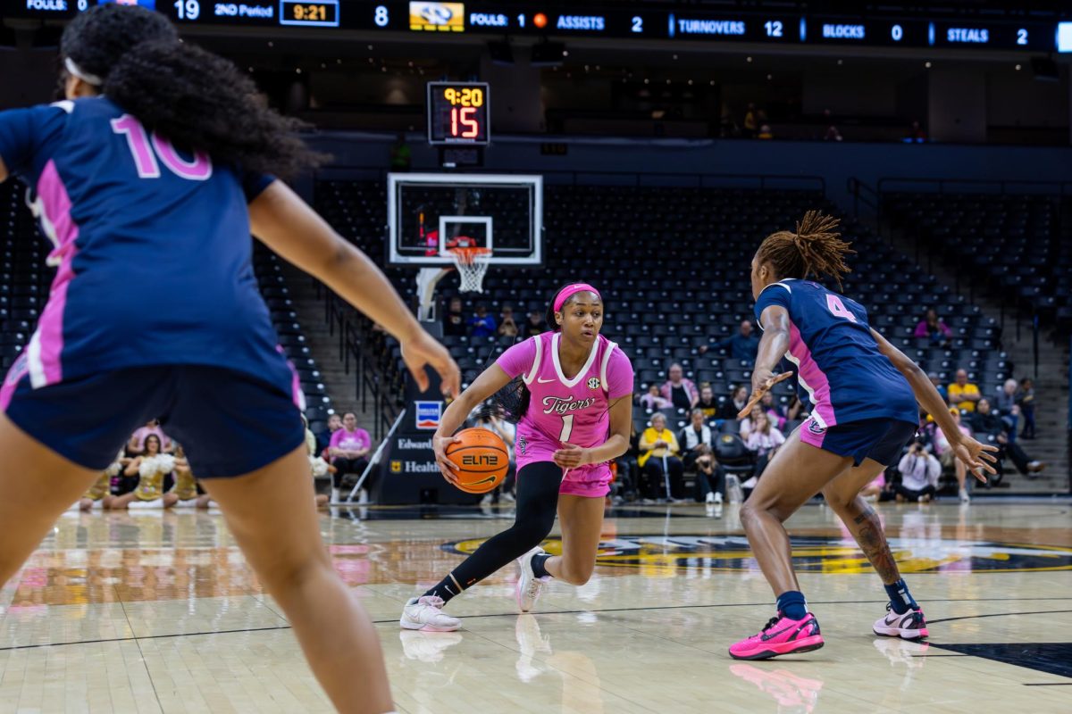  Missouri guard Shannon Dowell dribbles to the basket during the pink out game versus Auburn on Thursday, Feb. 19 at Mizzou Arena in Columbia, Mo. Dowell ended the night with seven points and one assist.