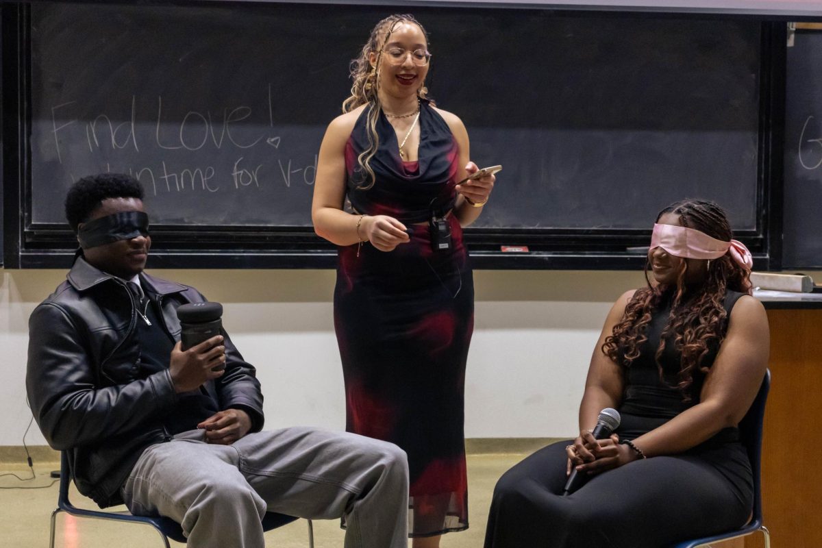 African Student Association (ASA) President, Uzo Chukwu, asks contestants questions to test if love is blind on Tuesday, Feb. 10, at Schulundt Hall in Columbia Mo.