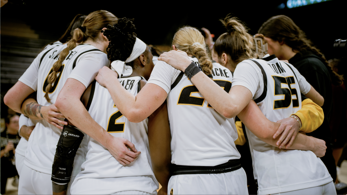 Missouri women’s basketball team gathers for a pregame huddle before the game against Texas A&M on January 26 at Mizzou Arena in Columbia, Mo. The Tigers clinched the Aggies with a score of 81 to 70. 