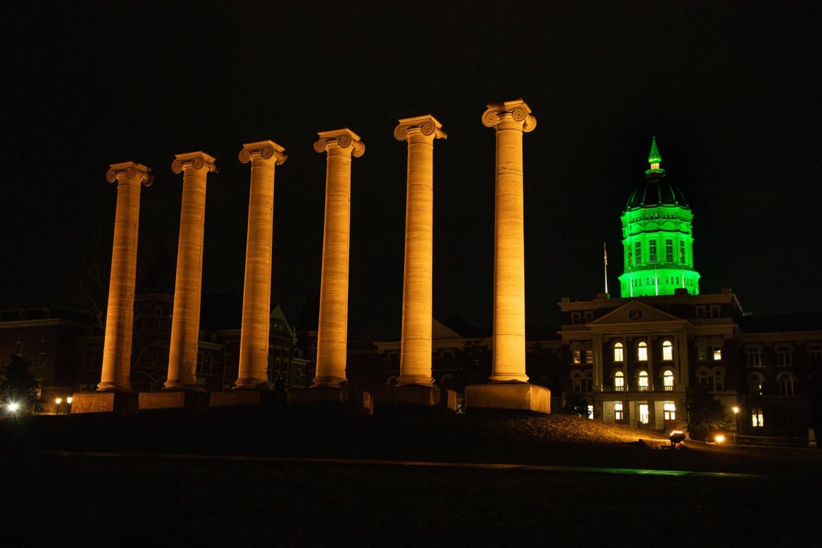 Jesse Hall’s dome is lit green after the E-Week lighting on Friday, March 6, in Columbia, Mo. The dome will stay green each night of E-Week, through the end of the event on Saturday, March 14. 