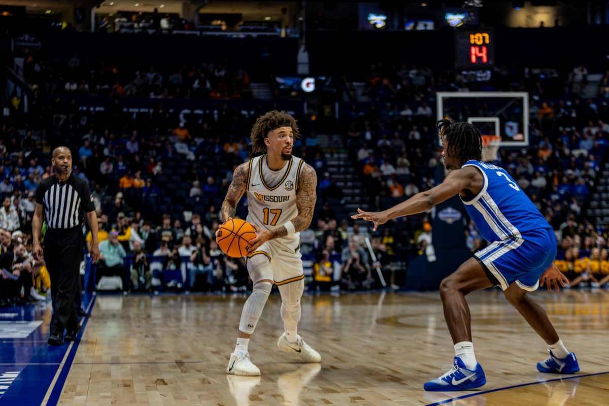Missouri guard Jayden Stone looks for an open teammate in a game against Kentucky on Thursday, March 12, at Bridgestone Arena in Nashville, Tenn. 
