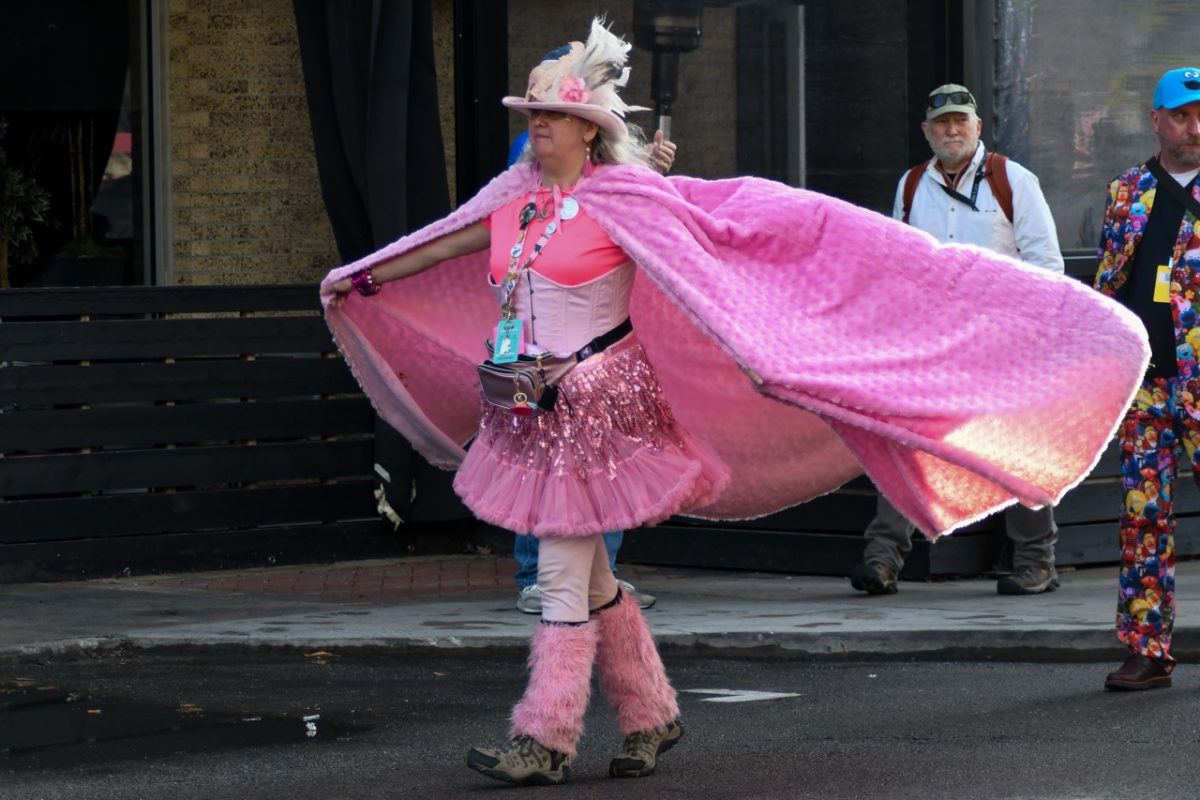 A Q Queen waves her blanket cape in the wind during the March March on Friday, March 6 in Columbia, Mo. The Q Queens led and paced the parade, followed by the Mobile Funk Unit, Patchwork Family Farms, Camp True/False, local families and more.