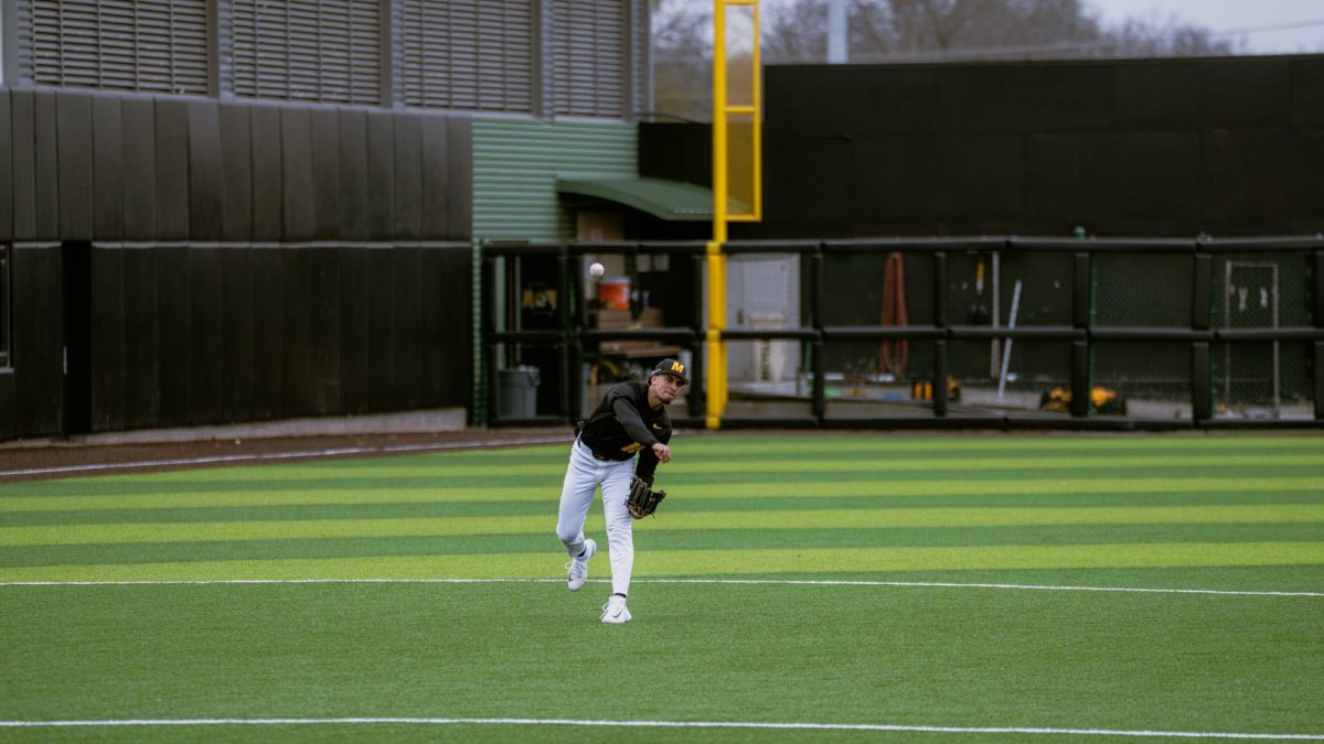 Missouri baseball player Isaiah Frost fields a ground ball and makes the throw to first base on Tuesday, Feb. 24 at Taylor Stadium in Columbia, Mo.