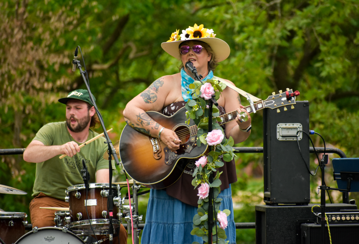 Artist Meredith Shaw performs at the Earth Day Festival on Sunday, April 26 at Peace Park in Downtown Columbia, Mo. The festival had a total of six performers playing on the Peace Park stage.